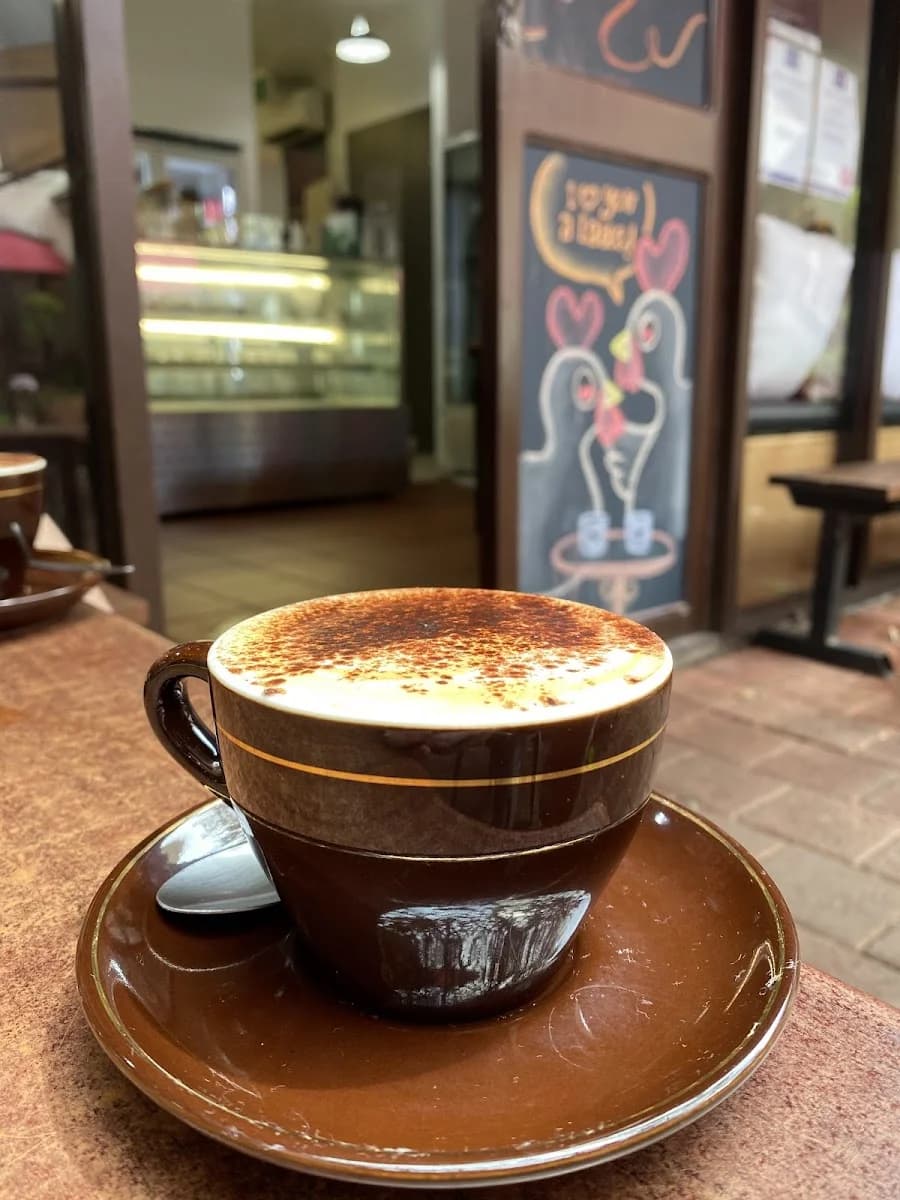 Latte art at Four Birds Cafe Darwin