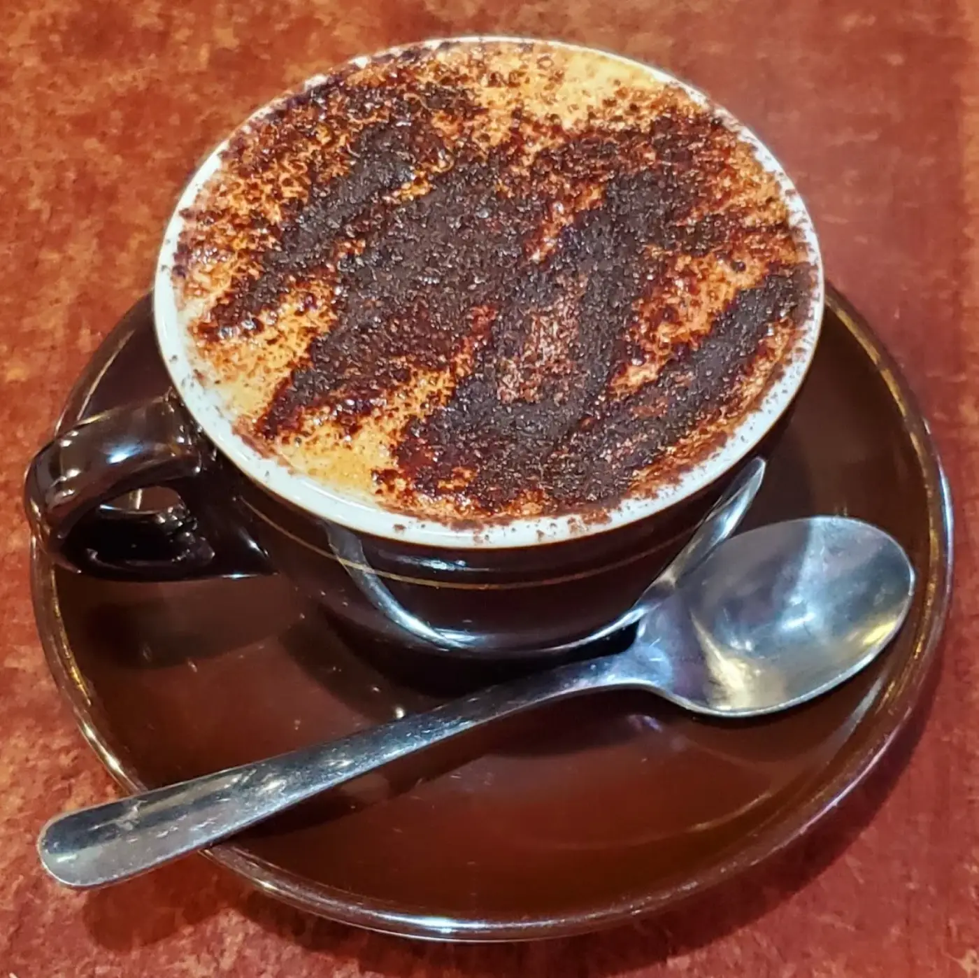 Cappuccino with chocolate swirl art