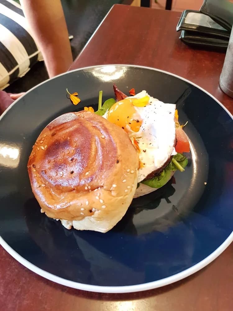 Brioche bun with poached egg at Four Birds