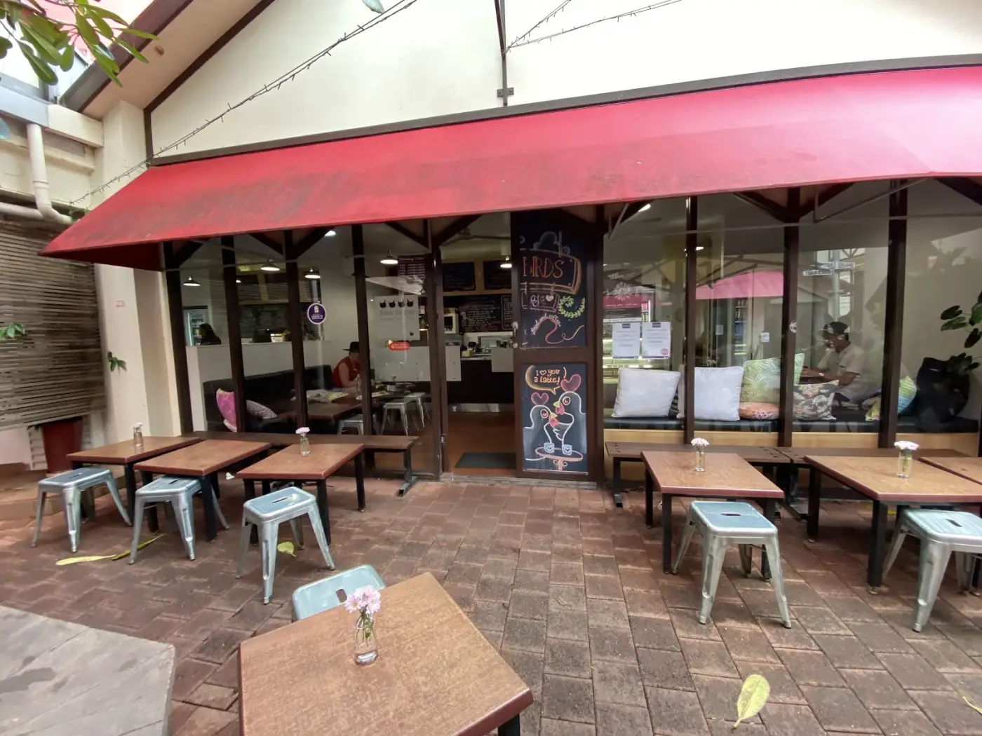 Four Birds Cafe courtyard in Star Village Arcade, Darwin